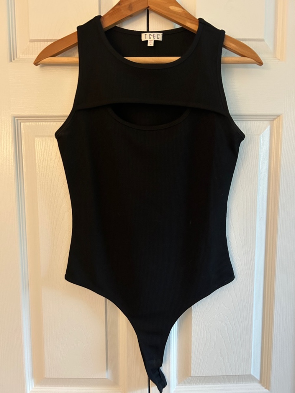 TCEC Black Ribbed High-Neck Sleeveless Bodysuit with Front Cutout
